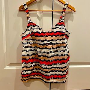 Cute tank top. Adjustable straps.